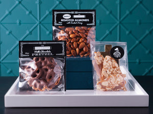 The Food Purveyor Chocolate Coated Pretzels 100g and The Food Purveyor Butter Almond Toffee 80g